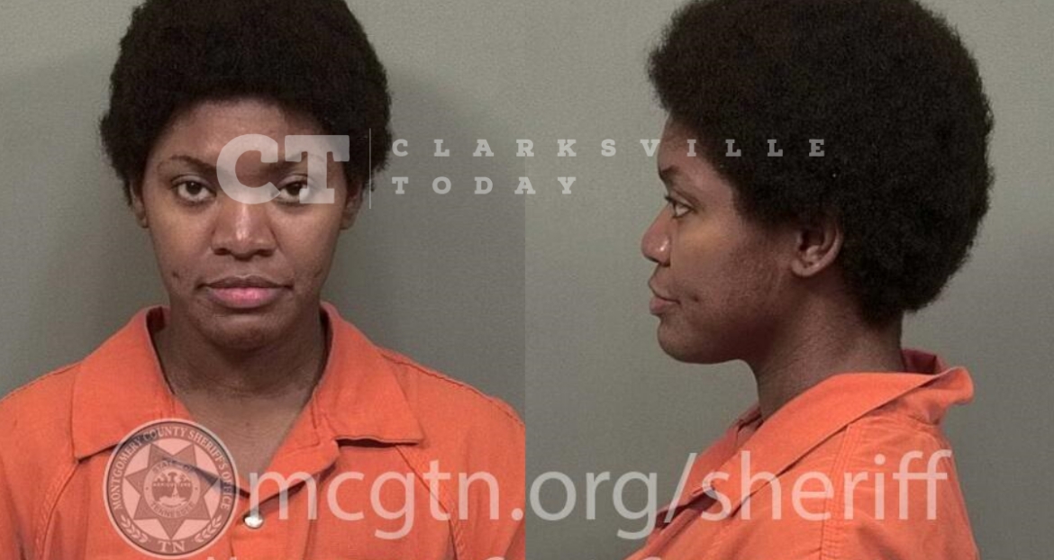 Alisha Travis attempted to stab her child’s father as he sat in a vehicle