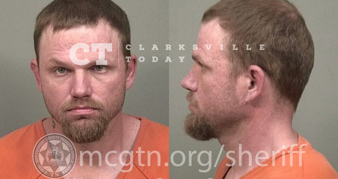Carl Keeling booked after hitting officer’s hand while passing traffic stop in Ford E-350